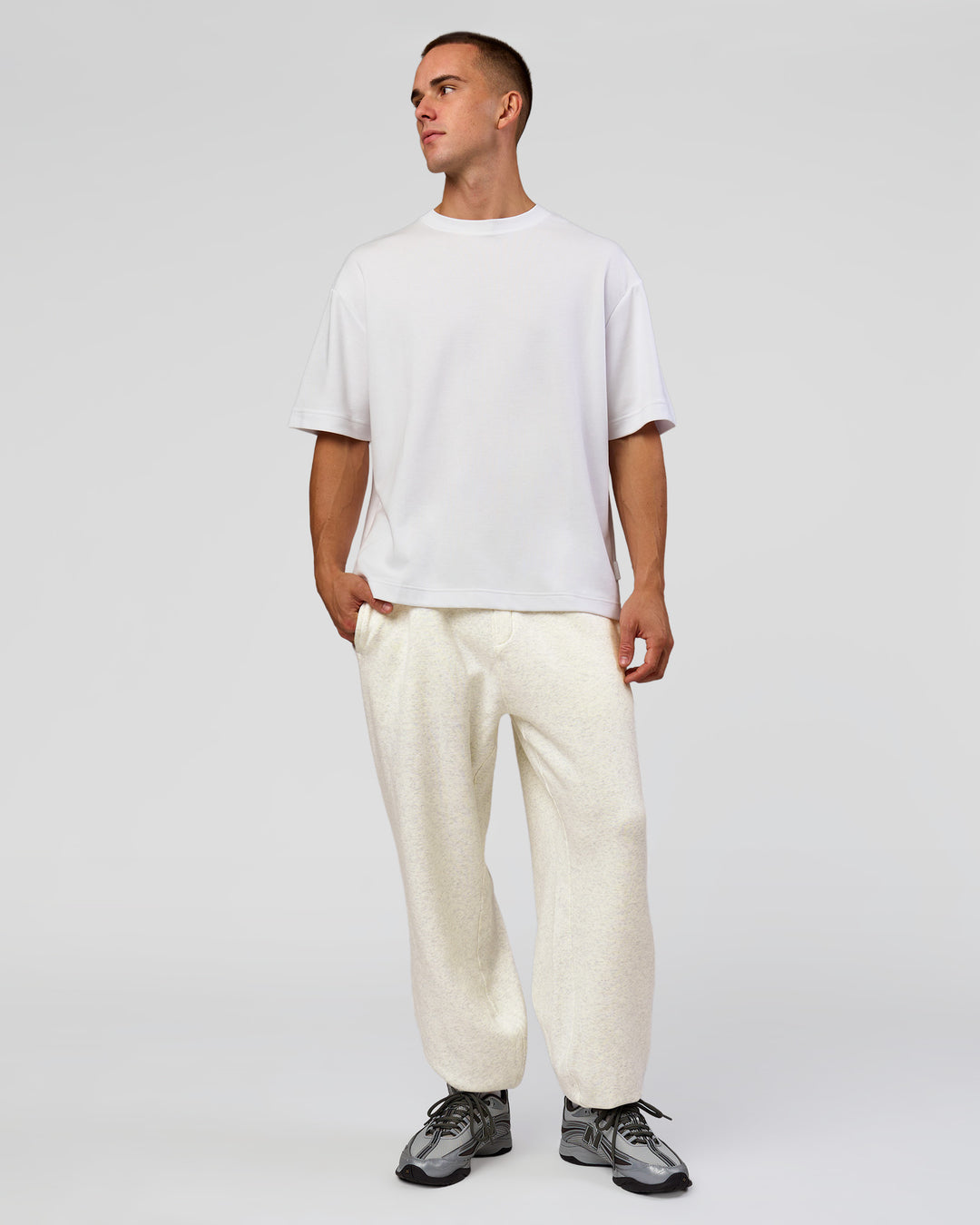 Man wearing Base Baggy Cuffed Track Pant - Silver Marl | Model:Albert | Size:M - view 2