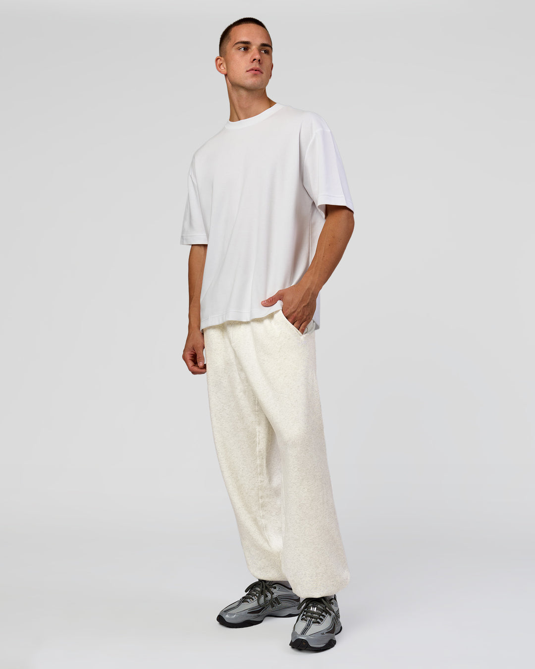 Man wearing Base Baggy Cuffed Track Pant - Silver Marl | Model:Albert | Size:M - view 5