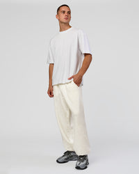 Man wearing Base Baggy Cuffed Track Pant - Silver Marl | Model:Albert | Size:M | Thumbnail Index: 4
