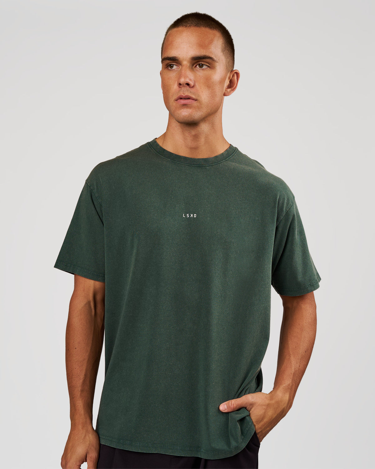 Man wearing Base FLXCotton Tee - Midnight Green Washed | Model:Albert | Size:M