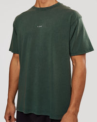 Man wearing Base FLXCotton Tee - Midnight Green Washed | Model:Albert | Size:M | Thumbnail Index: 1