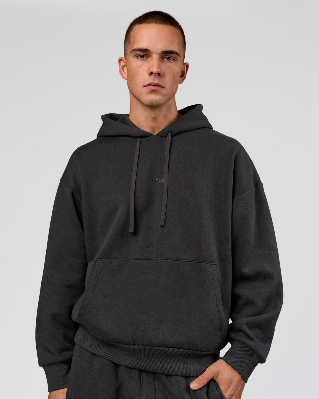 Man wearing Base Oversized DC Hoodie - Onyx | Model:Albert | Size:M - view 2