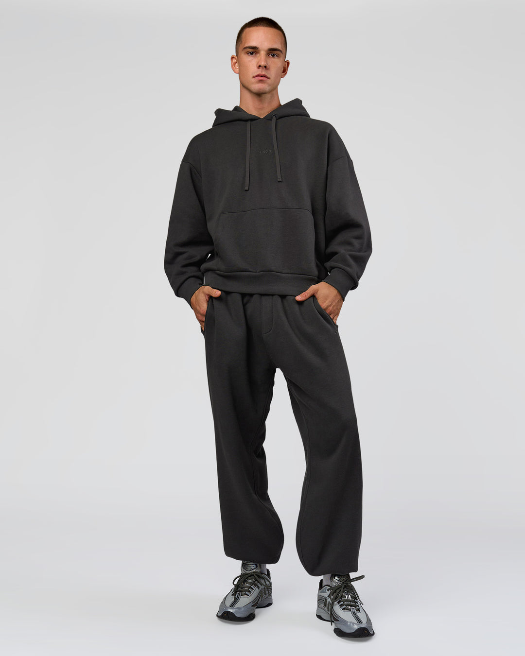 Man wearing Base Oversized DC Hoodie - Onyx | Model:Albert | Size:M - view 10