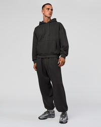 Man wearing Base Oversized DC Hoodie - Onyx | Model:Albert | Size:M | Thumbnail Index: 11