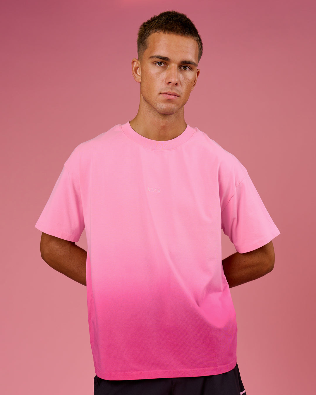 Man wearing BCAM Ombre Heavyweight FLXCotton Oversized Tee  - Pink Rose-Ultra Pink | Model:Albert | Size:M - view 2
