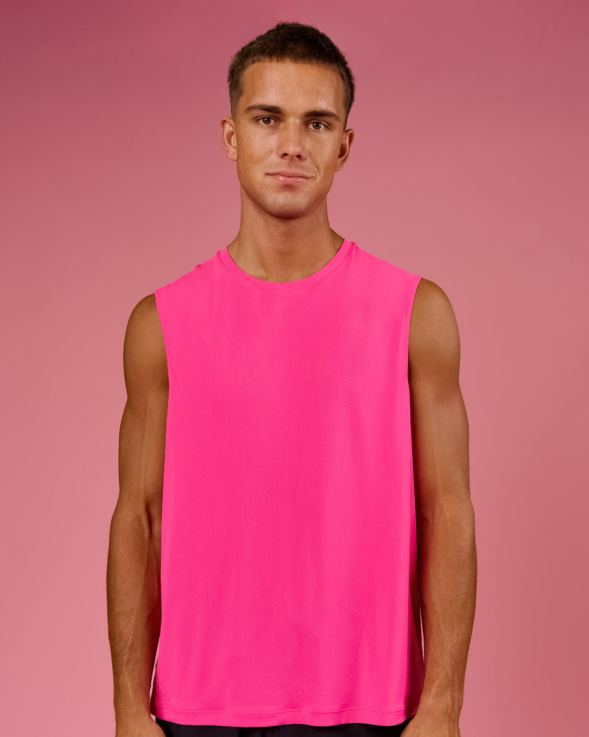 Man wearing BCAM Rep Muscle Training Tank - Ultra Pink | Model:Albert | Size:M - view 2