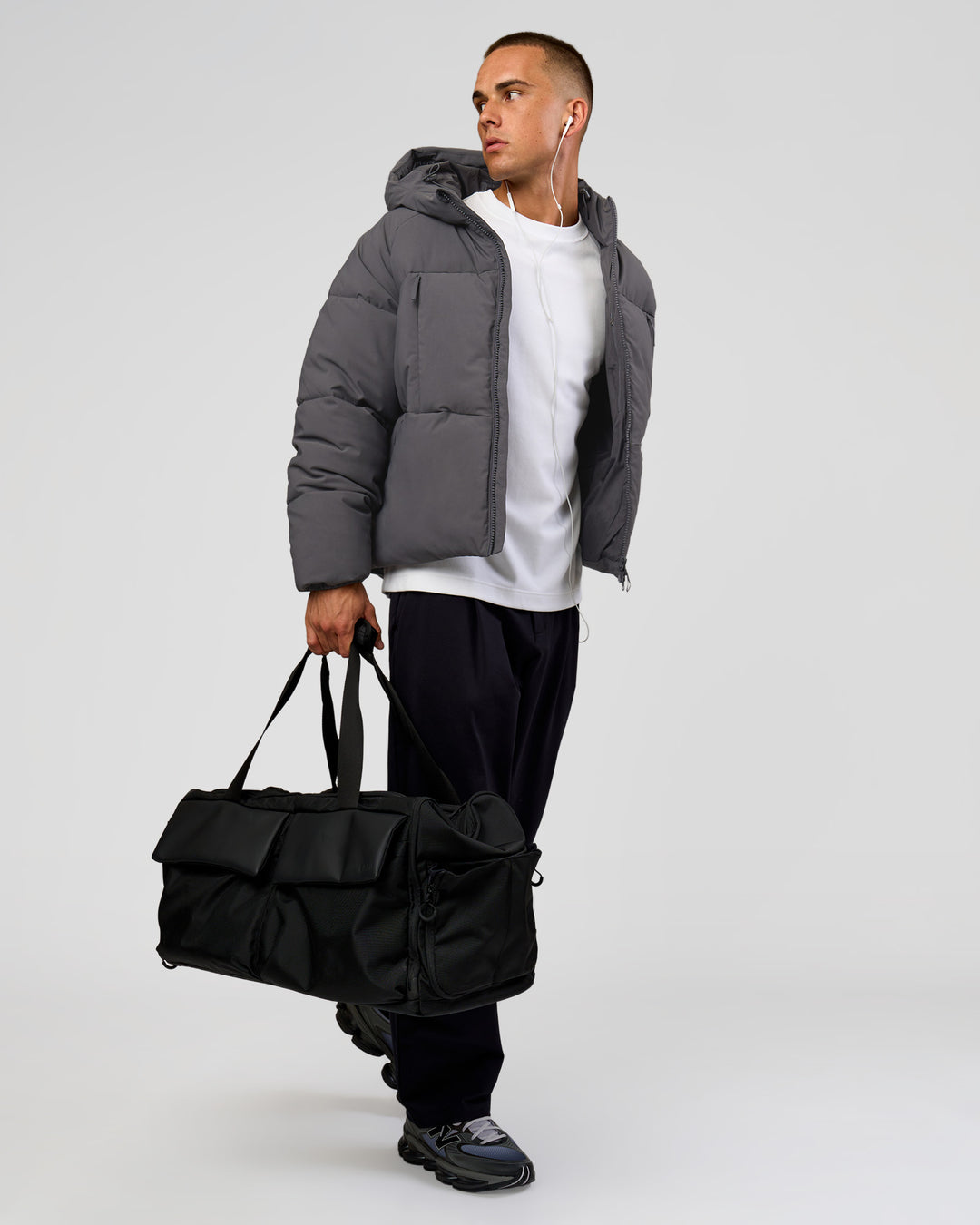 Man wearing Blackout Puffer Jacket - Dark Storm-Black | Model:Albert | Size:M - view 16