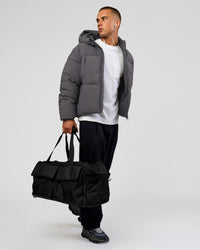 Man wearing Blackout Puffer Jacket - Dark Storm-Black | Model:Albert | Size:M | Thumbnail Index: 15