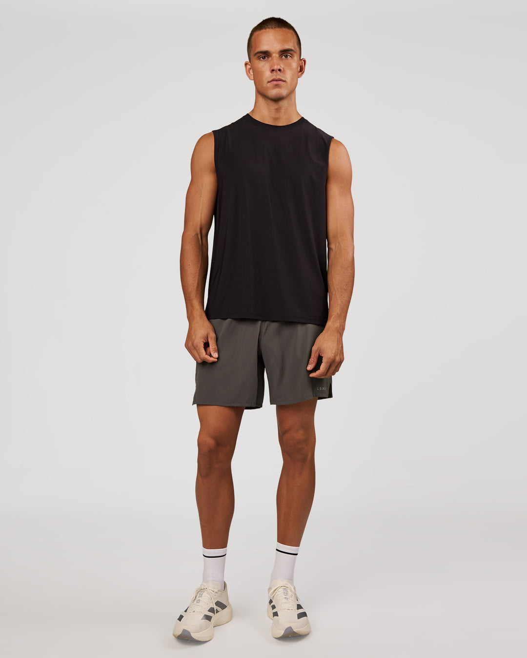 Man wearing Cadence Swift Muscle Tank - Black | Model:Albert | Size:M - view 4