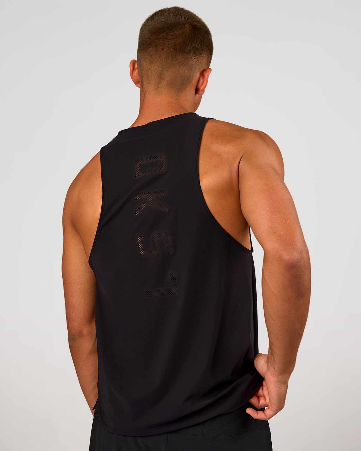 Man wearing Cadence Swift Tank - Black | Model:Albert | Size:M