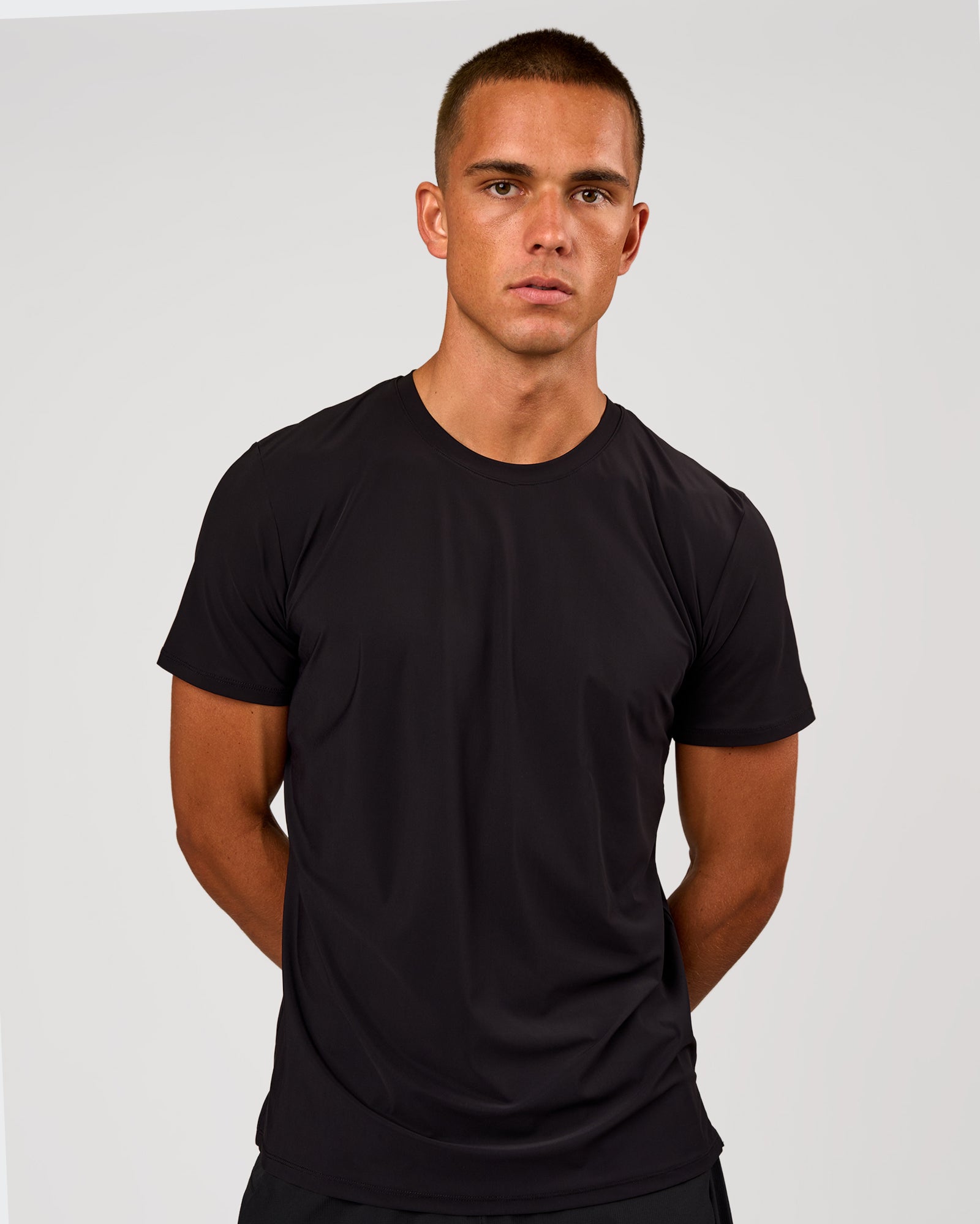 Man wearing Cadence Swift Tee - Black | Model:Albert | Size:M