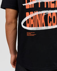 Man wearing Coffee Run FLXCotton Oversized Tee - Black-Ultra Orange | Model:Albert | Size:M | Thumbnail Index: 16