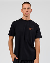 Man wearing Coffee Run FLXCotton Oversized Tee - Black-Ultra Orange | Model:Albert | Size:M | Thumbnail Index: 18
