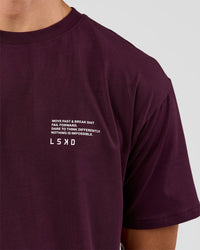 Man wearing Coffee Run FLXCotton Oversized Tee - Cherry Lacquer-Black | Model:Albert | Size:M | Thumbnail Index: 10