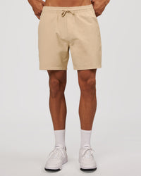 Man wearing Daily 7" Short 3.0 - Dunedust | Model:Albert | Size:M | Thumbnail Index: 1