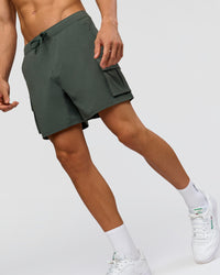 Man wearing Functional Cargo 6" Short - Carbon Green | Model:Albert | Size:M | Thumbnail Index: 10
