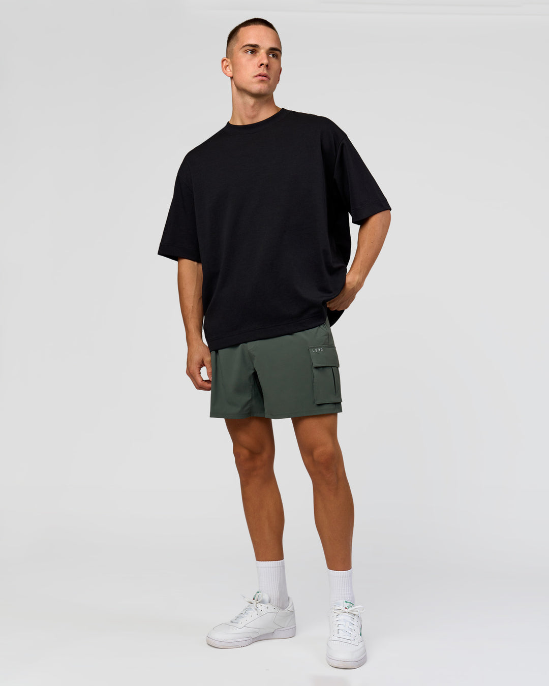Man wearing Functional Cargo 6" Short - Carbon Green | Model:Albert | Size:M - view 5