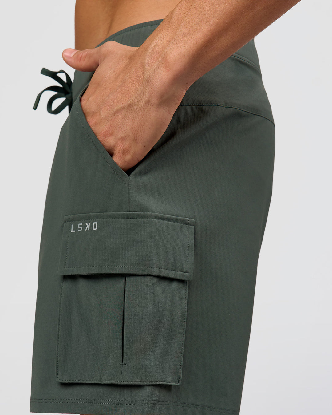 Man wearing Functional Cargo 6" Short - Carbon Green | Model:Albert | Size:M - view 7