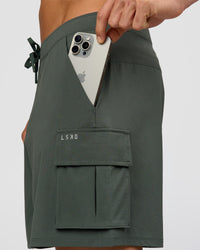 Man wearing Functional Cargo 6" Short - Carbon Green | Model:Albert | Size:M | Thumbnail Index: 8