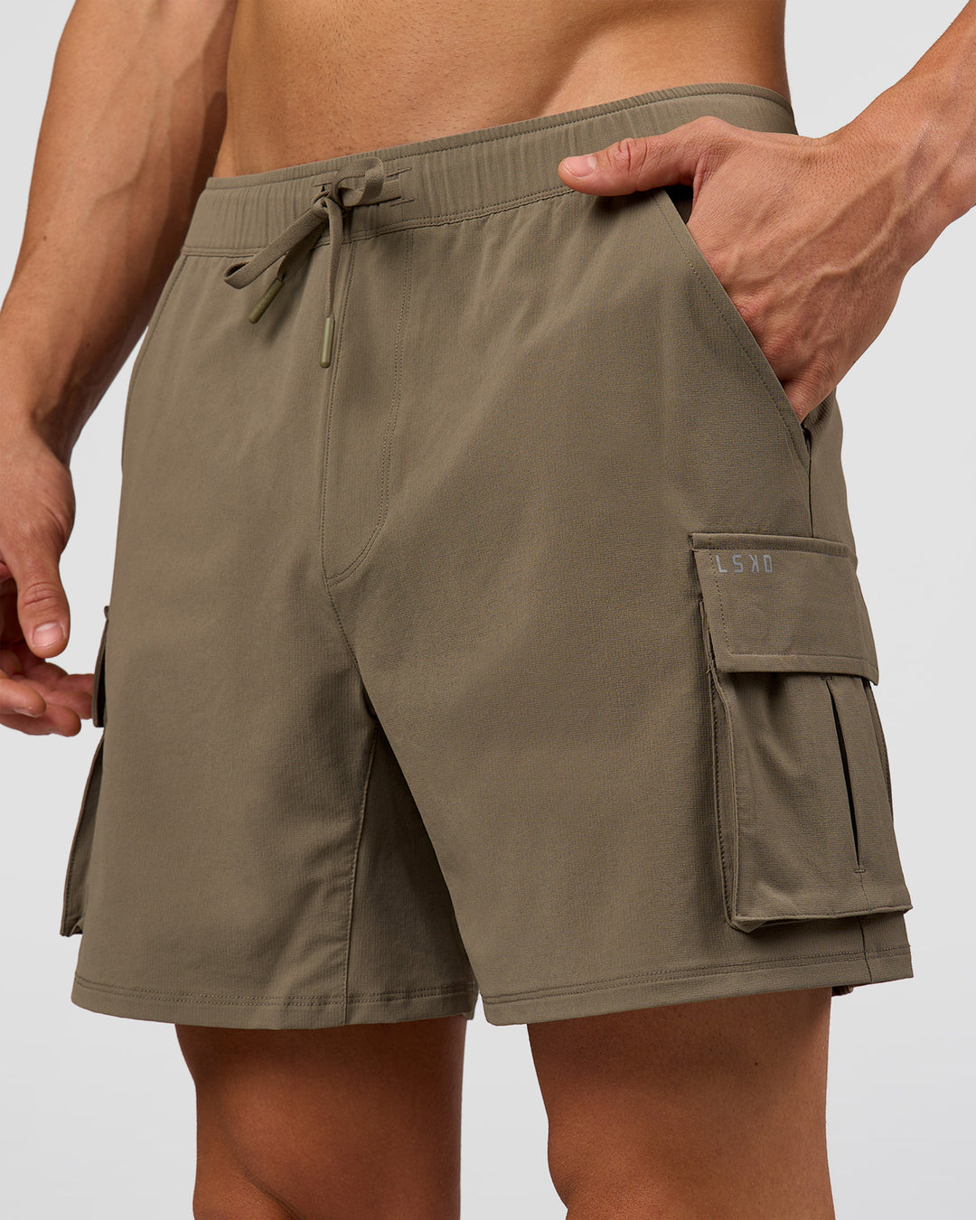 Man wearing Functional Cargo 6" Short - Walnut Grey | Model:Albert | Size:M - view 1