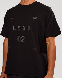 Man wearing Game Plan Heavyweight FLXCotton Oversized Tee - Black | Model:Albert | Size:M | Thumbnail Index: 0