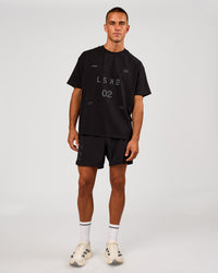 Man wearing Game Plan Heavyweight FLXCotton Oversized Tee - Black | Model:Albert | Size:M | Thumbnail Index: 7