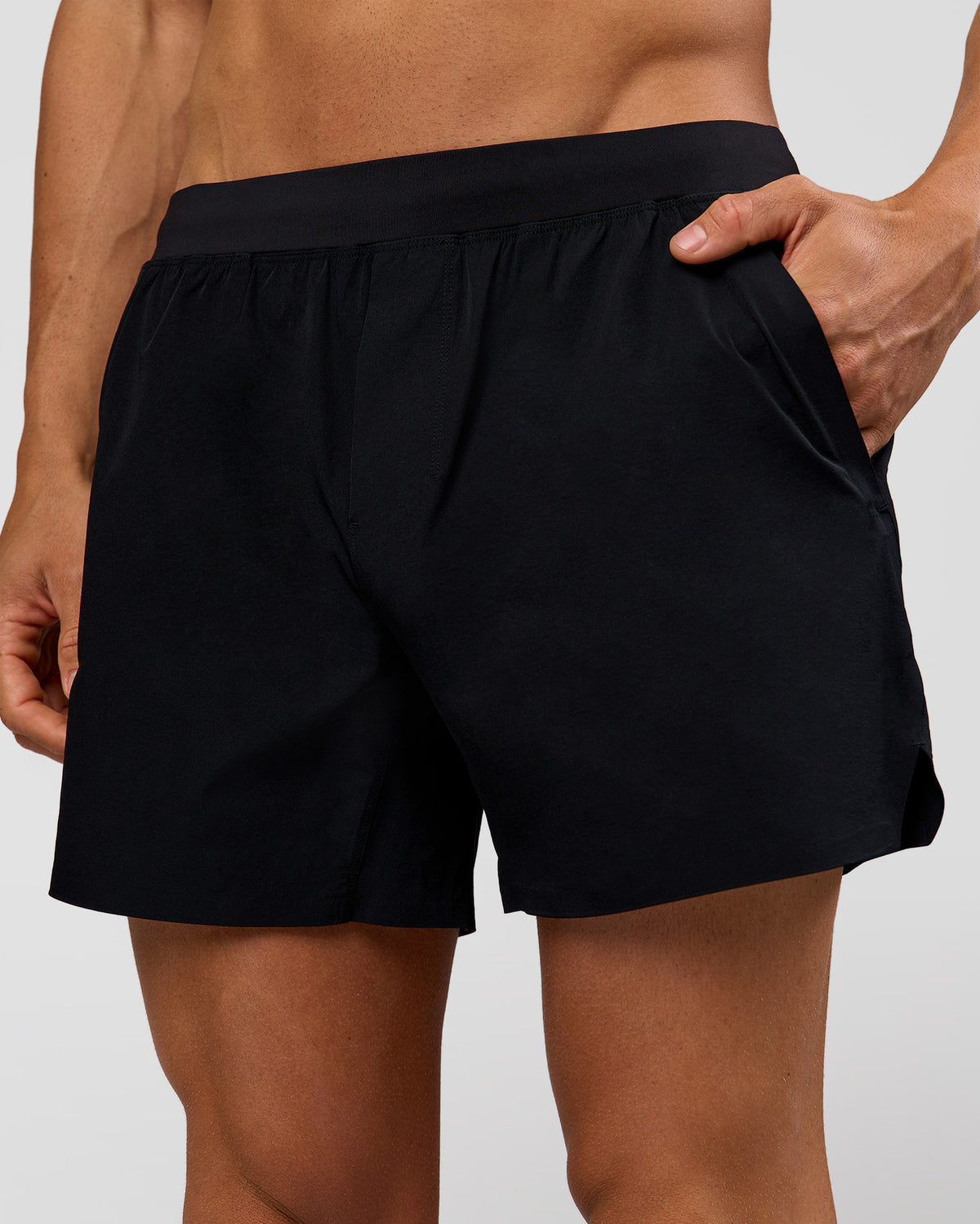 Man wearing Hybrid 5" Short - Black-Reflective | Model:Albert | Size:M