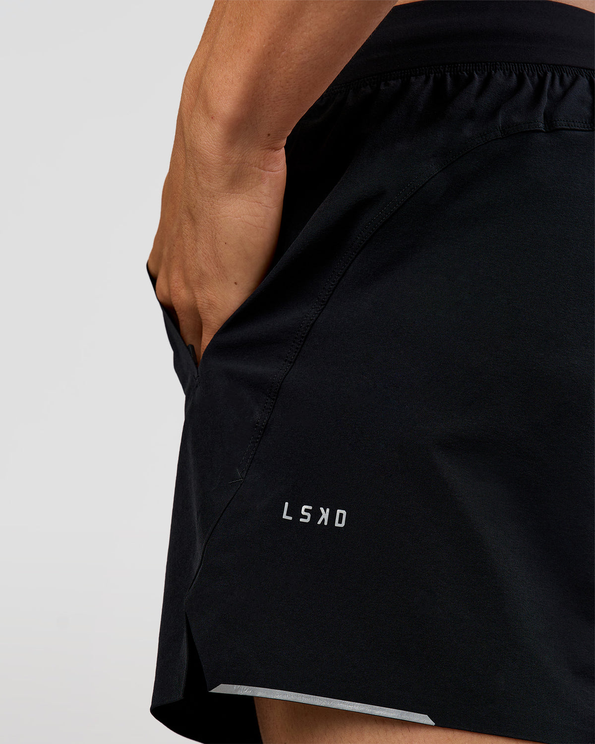 Man wearing Hybrid 5" Short - Black-Reflective | Model:Albert | Size:M