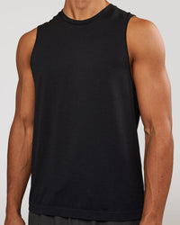 Man wearing AeroFLX+ Seamless Muscle Tank - Black Marl | Model:Albert | Size:M | Thumbnail Index: 2