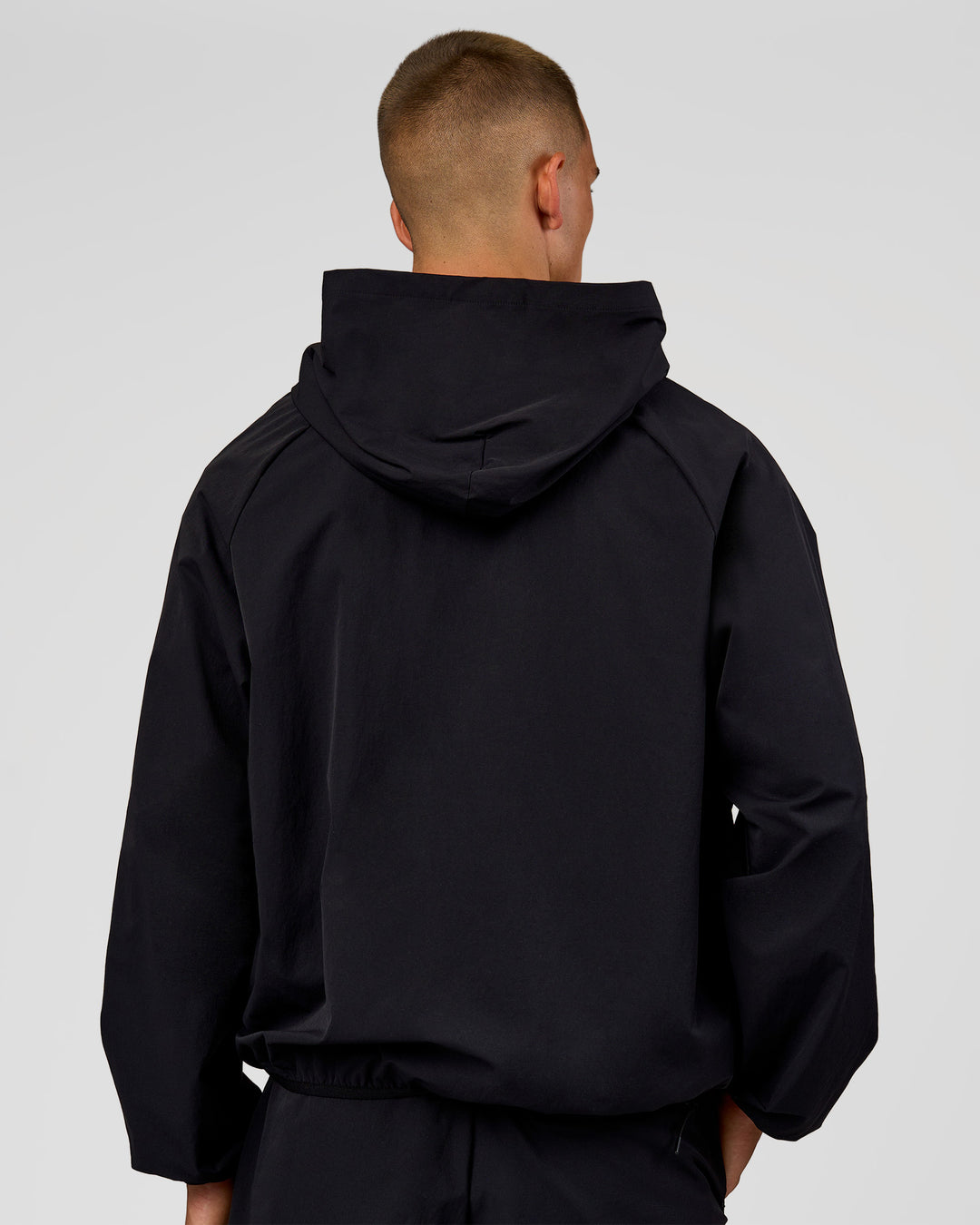 Man wearing Motion Hooded Jacket - Black | Model:Albert | Size:M - view 2