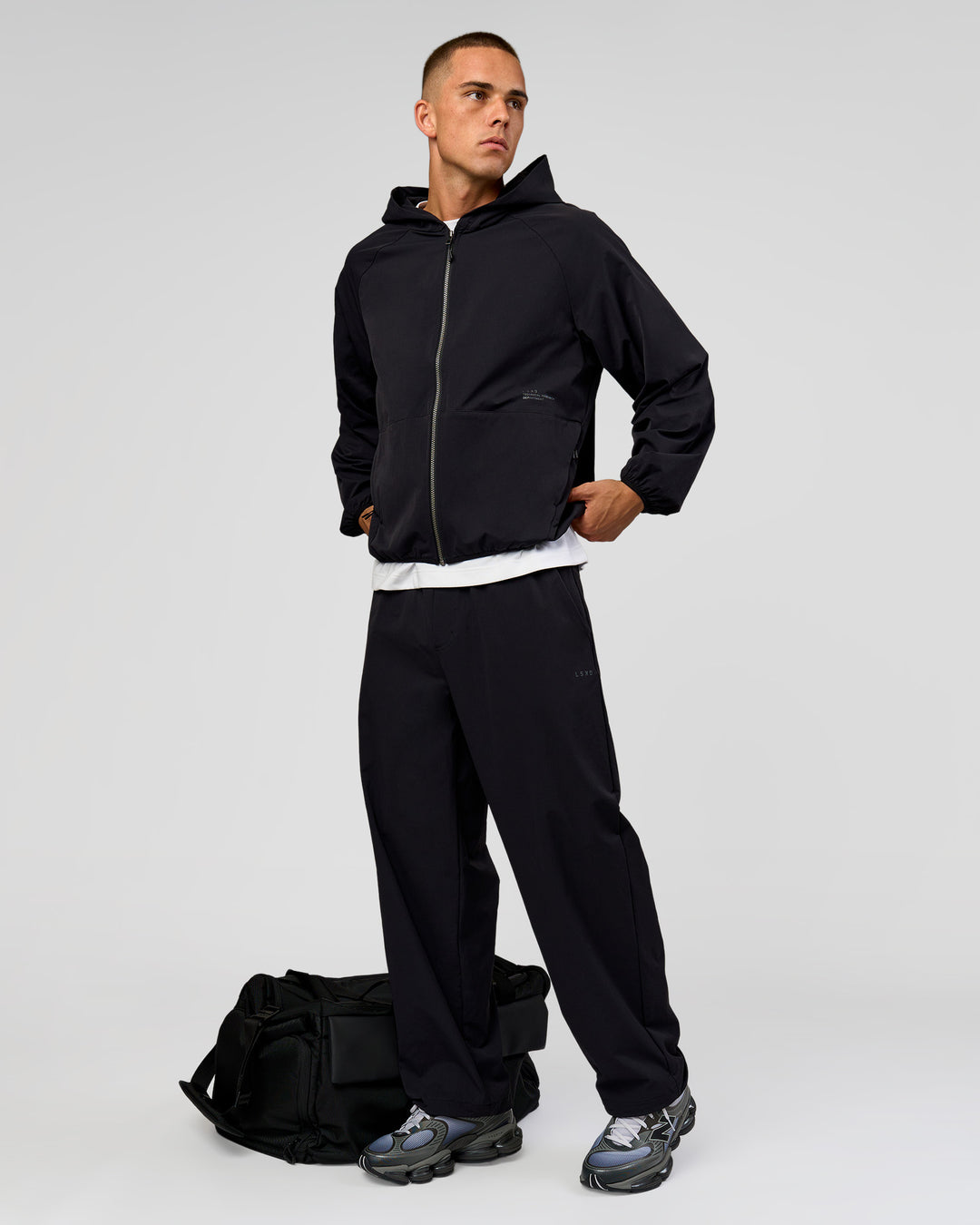 Man wearing Motion Hooded Jacket - Black | Model:Albert | Size:M - view 3