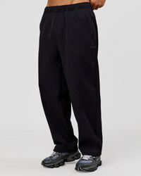 Man wearing Motion Wide Leg Pant - Black | Model:Albert | Size:M | Thumbnail Index: 0