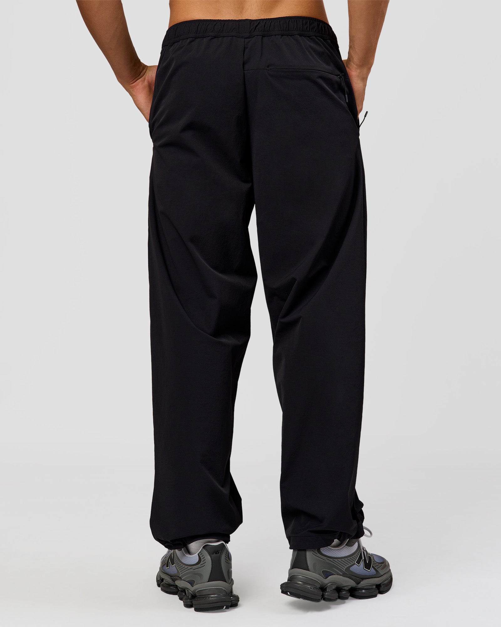 Man wearing Motion Wide Leg Pant - Black | Model:Albert | Size:M
