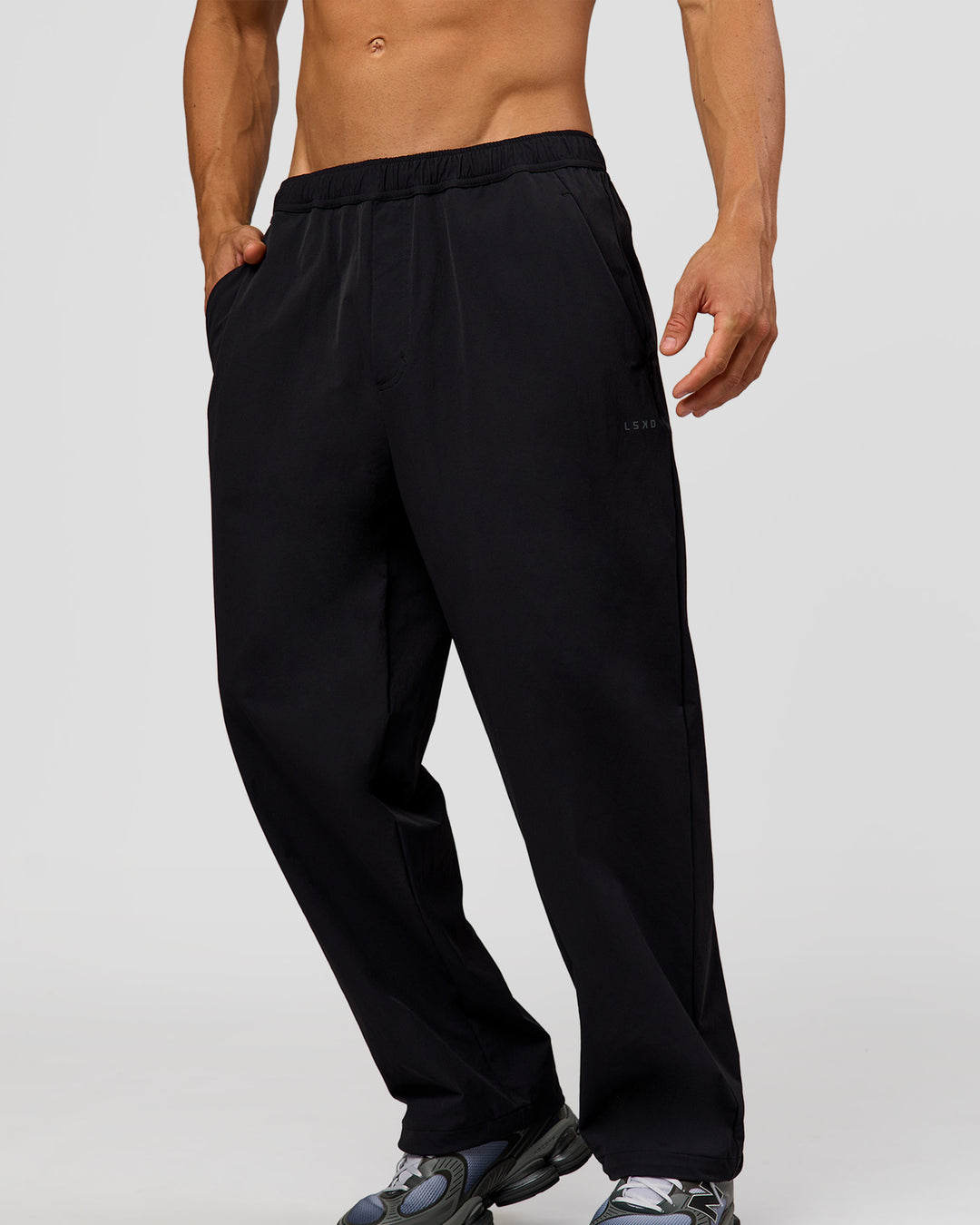 Man wearing Motion Wide Leg Pant - Black | Model:Albert | Size:M - view 4