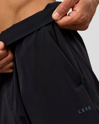 Man wearing Motion Wide Leg Pant - Black | Model:Albert | Size:M | Thumbnail Index: 4
