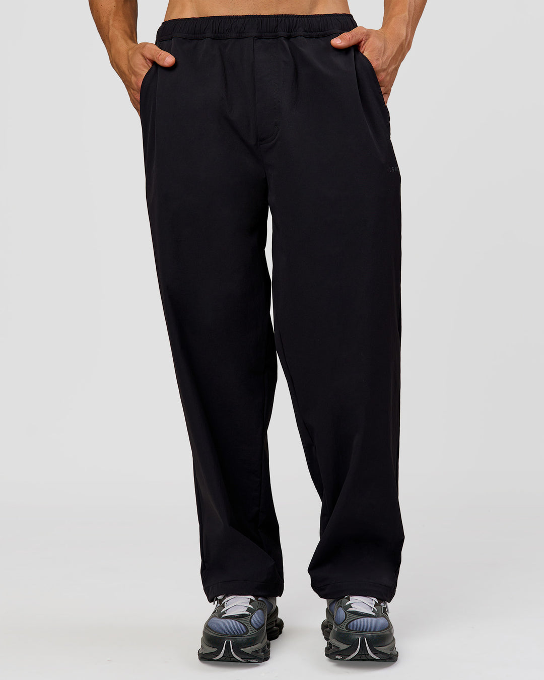 Man wearing Motion Wide Leg Pant - Black | Model:Albert | Size:M - view 7
