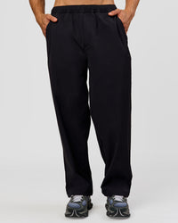Man wearing Motion Wide Leg Pant - Black | Model:Albert | Size:M | Thumbnail Index: 6