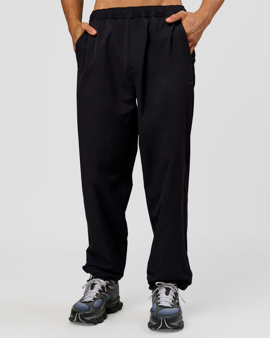 Man wearing Motion Wide Leg Pant - Black | Model:Albert | Size:M - view 10