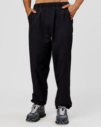 Man wearing Motion Wide Leg Pant - Black | Model:Albert | Size:M | Thumbnail Index: 9