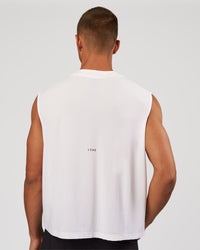 Man wearing Motionline Boxy Tank - White | Model:Albert | Size:M | Thumbnail Index: 5