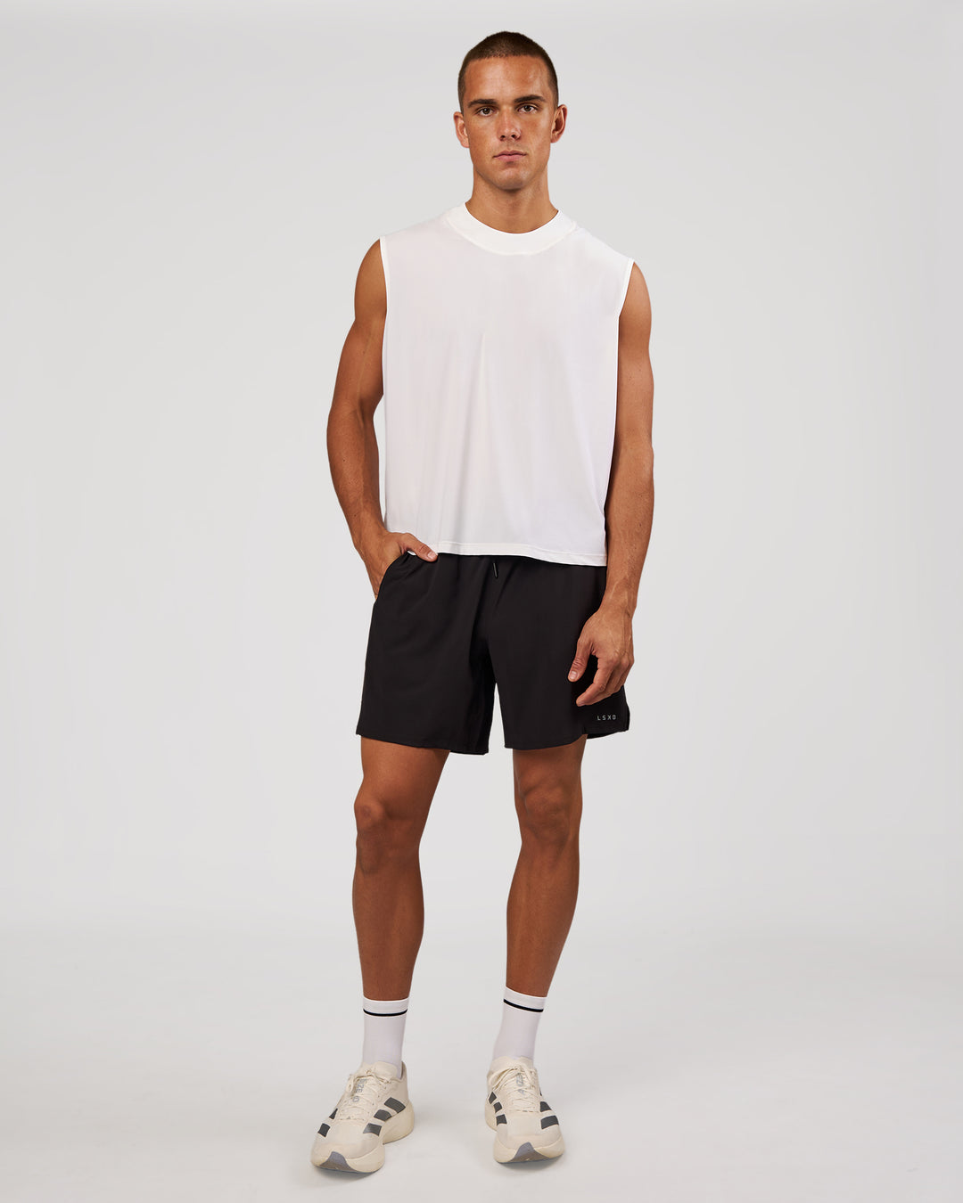 Man wearing Motionline Boxy Tank - White | Model:Albert | Size:M - view 11