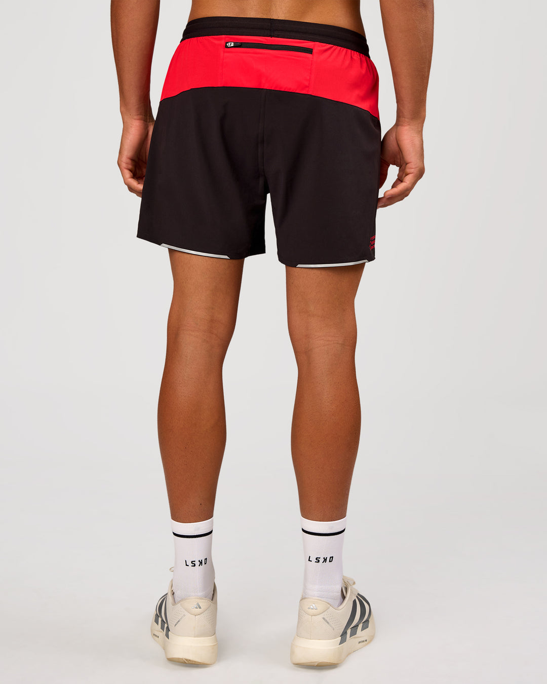 Man wearing Pace 5" Lined Running Short - Black-Scarlet | Model:Albert | Size:M - view 8