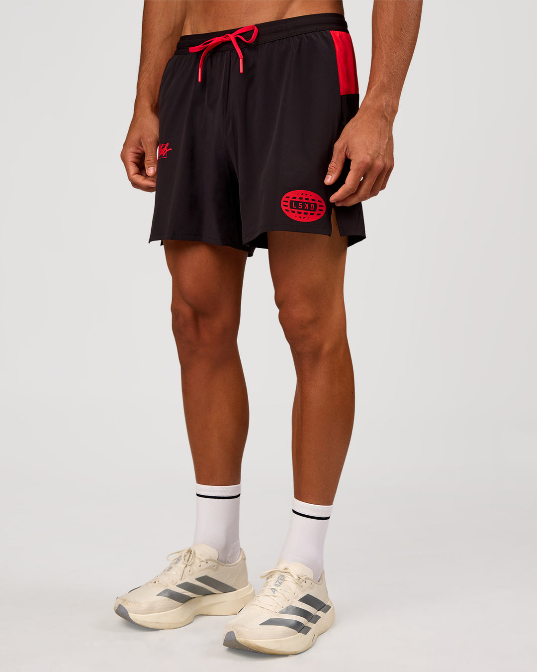 Man wearing Pace 5" Lined Running Short - Black-Scarlet | Model:Albert | Size:M - view 13