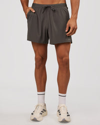 Man wearing Pace 5" Lined Running Short - Dark Storm | Model:Albert | Size:M | Thumbnail Index: 5