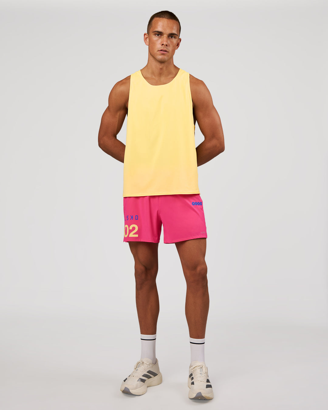 Man wearing Pace 5" Lined Running Short - Game Plan Ultra Pink | Model:Albert | Size:M - view 3