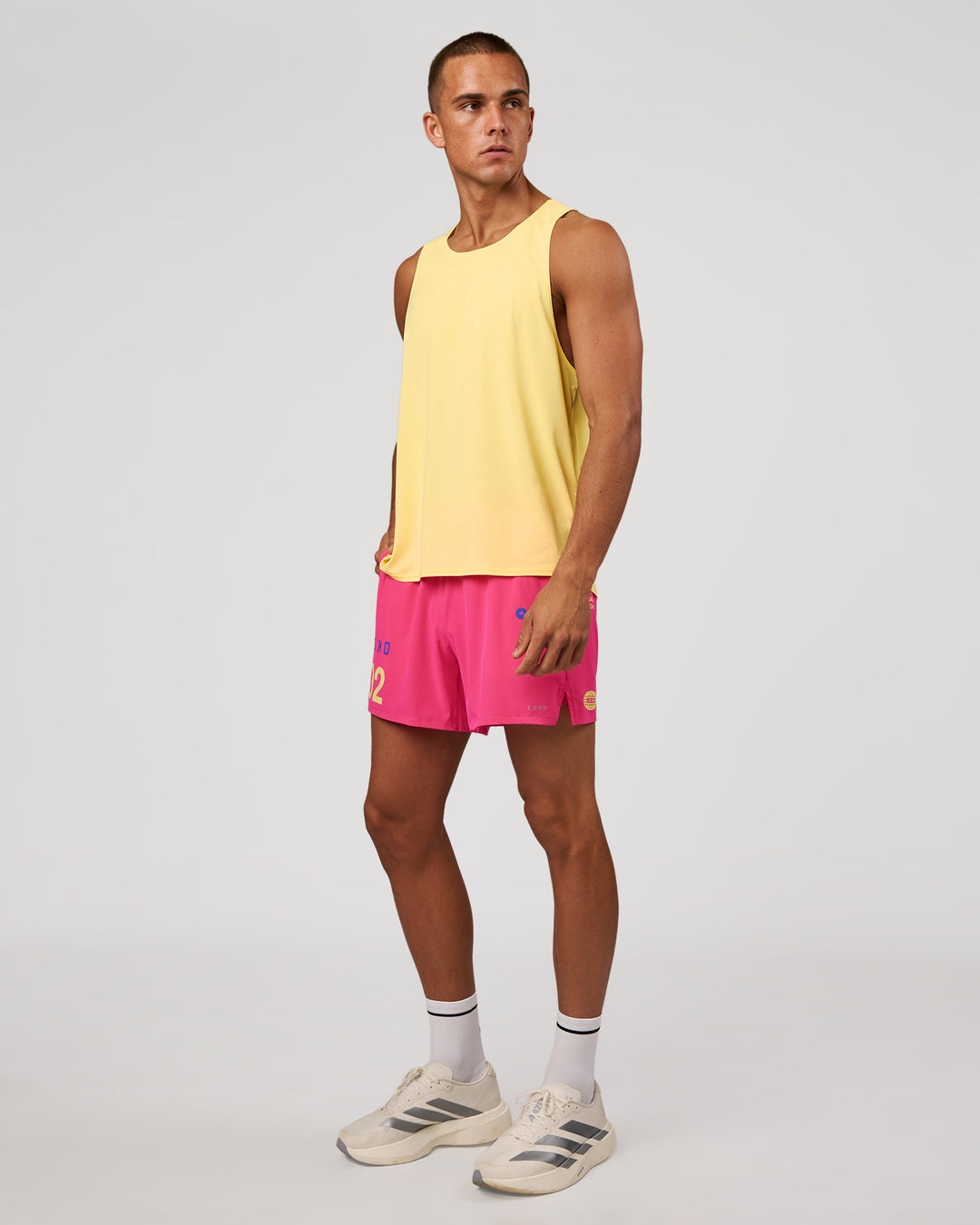 Man wearing Pace 5" Lined Running Short - Game Plan Ultra Pink | Model:Albert | Size:M - view 7