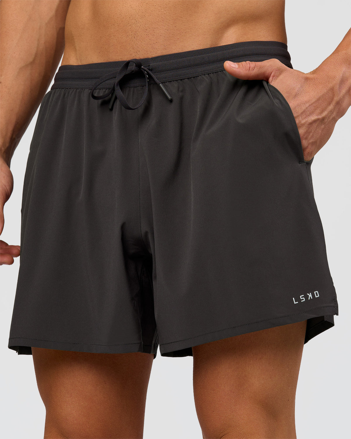 Man wearing Pace 5" Running Short - Black-Onyx | Model:Albert | Size:M