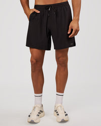 Man wearing Pace 7" Lined Running Short - Black-Reflective | Model:Albert | Size:M | Thumbnail Index: 5