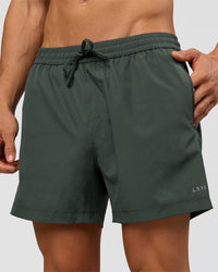 Man wearing Rep 5" Performance Short - Carbon Green | Model:Albert | Size:M | Thumbnail Index: 0