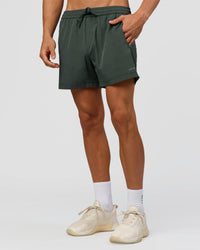 Man wearing Rep 5" Performance Short - Carbon Green | Model:Albert | Size:M | Thumbnail Index: 1